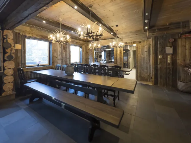 Living room with table and benches.