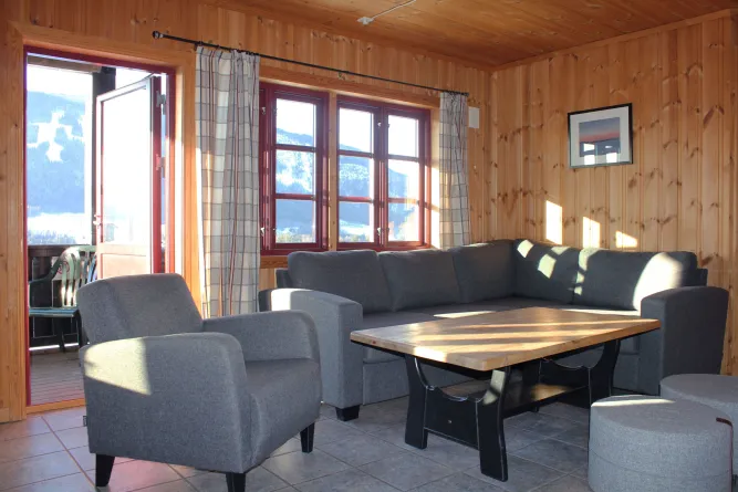 A sofa and a table in a room.
